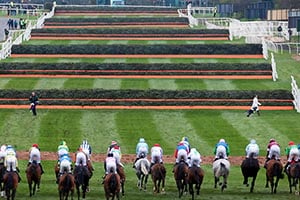 Horses running at Aintree Racecourse on Grand Opening Day